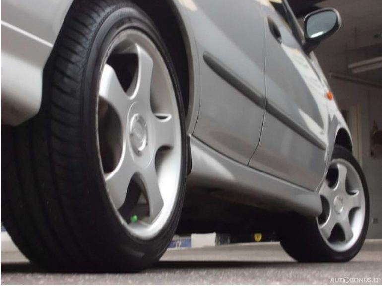 Nissan Almera Tino | 7